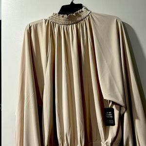 Beige turtle neck bodysuit